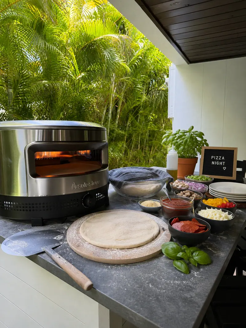 Outdoor pizza oven station set up for al fresco dinners